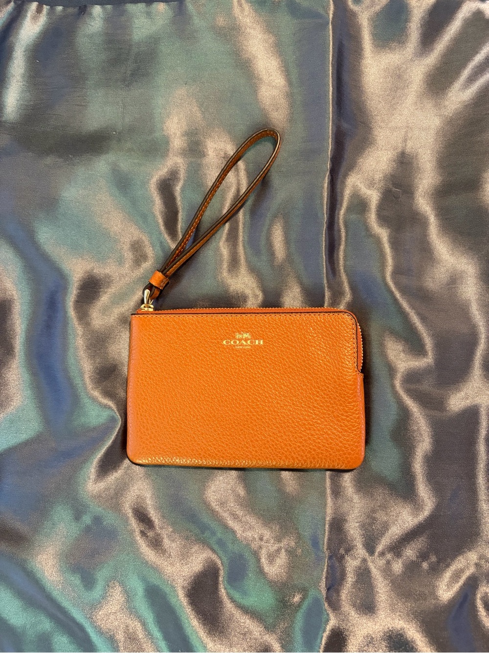 Coach Orange Leather Wristlet Clutch with Gold Logo